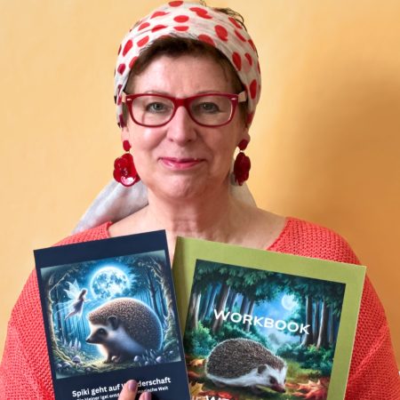 Foto von Eliande Vanderbeldt mit ihren zwei Büchern